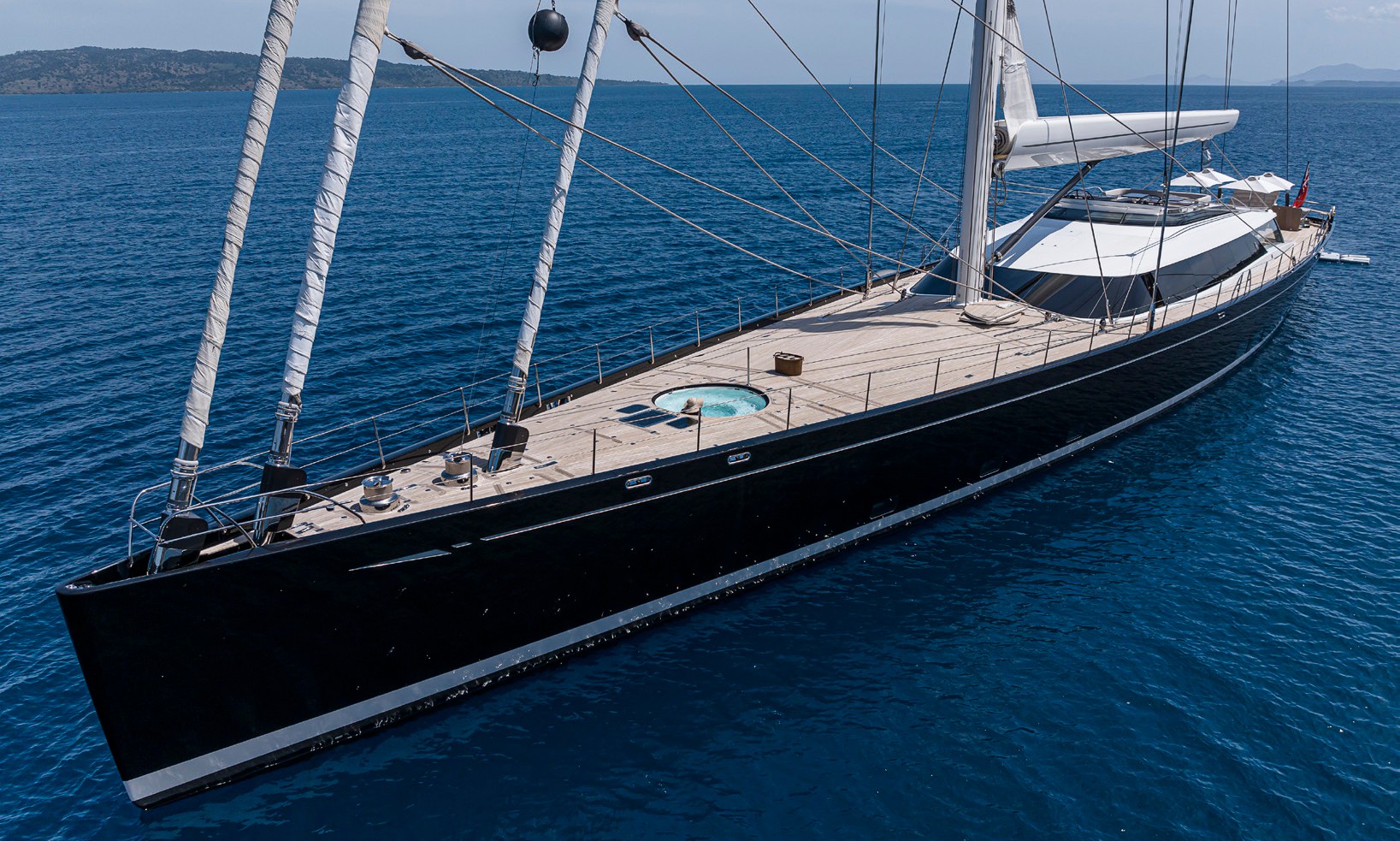 Sail in style with luxury superyacht KOKOMO, an award-winning 58.4m Alloy sloop, available in the Caribbean and Mediterranean.