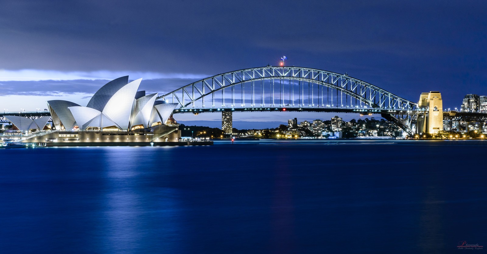 Sydney Harbour with Sydney Opera House and Harbour Bridge seen from a yacht
