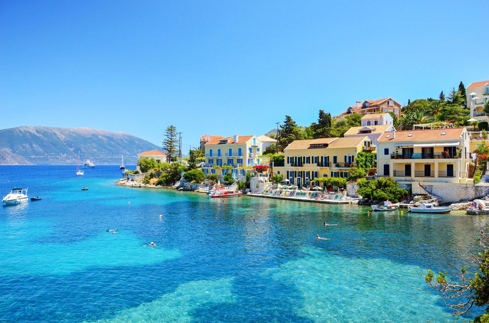 Boats moored at Sami Port marina in Kefalonia during charter embarkation.